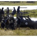 Children on game drive at Sosian Lodge, Laikipia, Kenya.