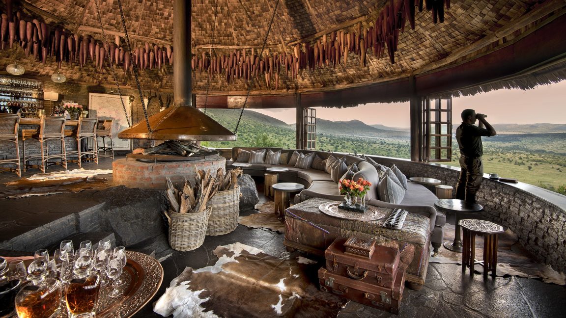 Guest lounge overlooking the Serengeti's northern plains at andBeyond Klein's Camp